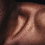 brown textile on black textile